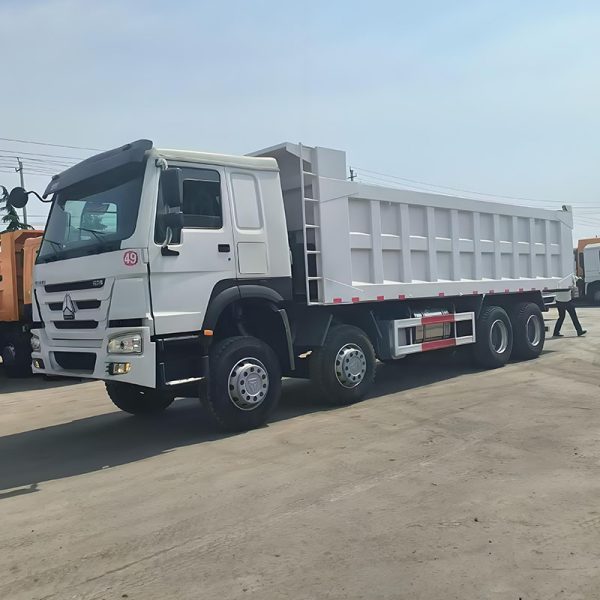 Used dump truck in a used tractor truck vs used dump truck project comparison