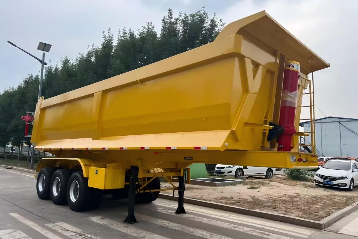 Dump trailer body with front hydraulic lifting cylinder