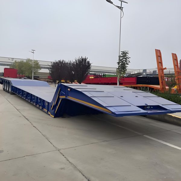 Folding gooseneck lowboy trailer for powered front loading path